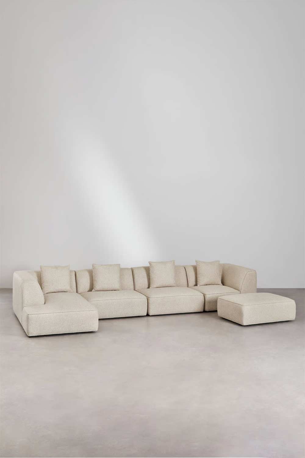 UV HOME 4-piece modular chaise longue sofa on the left with Cardea upholstered pouf