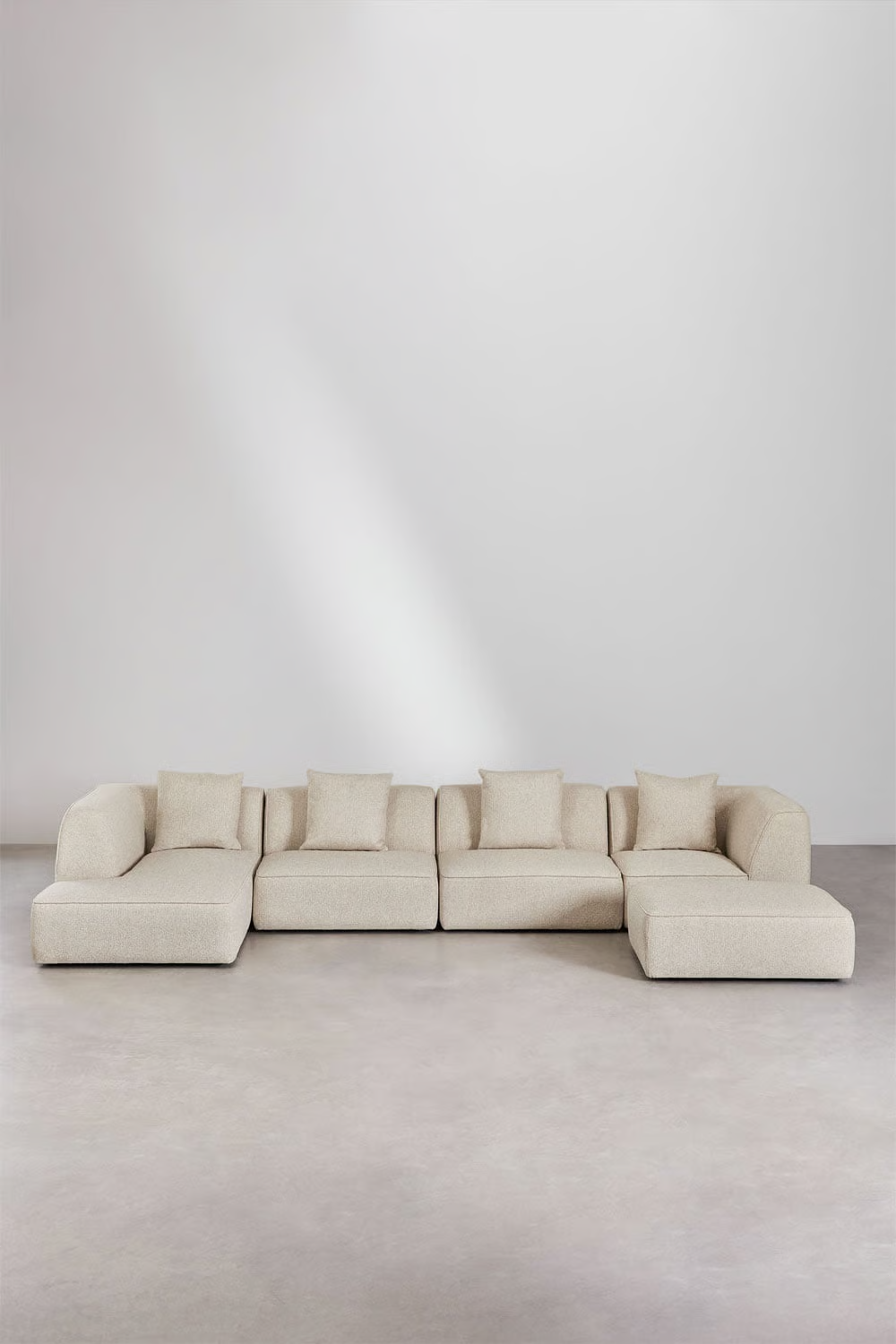 UV HOME 4-piece modular chaise longue sofa on the left with Cardea upholstered pouf