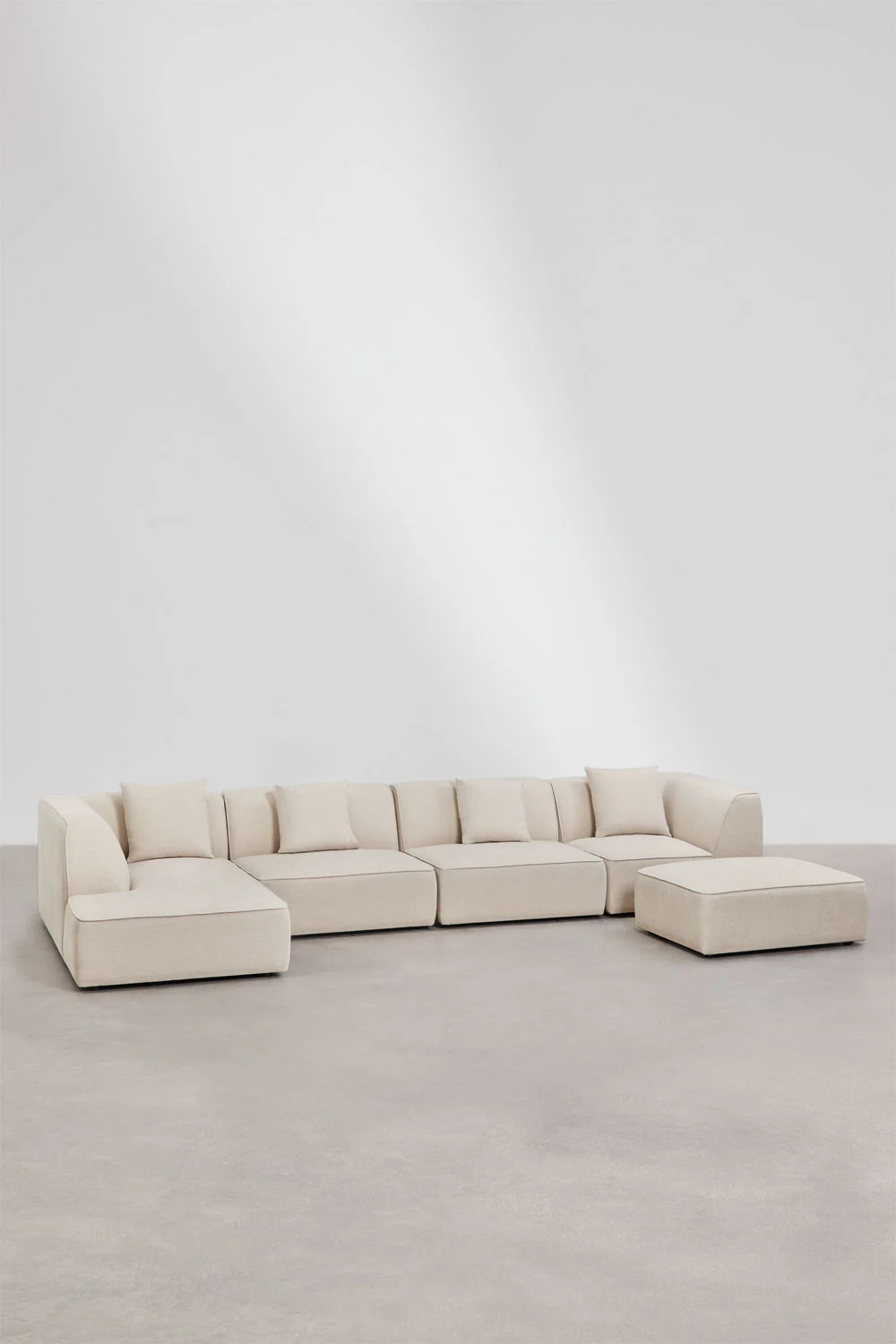 UV HOME 4-piece modular chaise longue sofa on the left with Cardea upholstered pouf