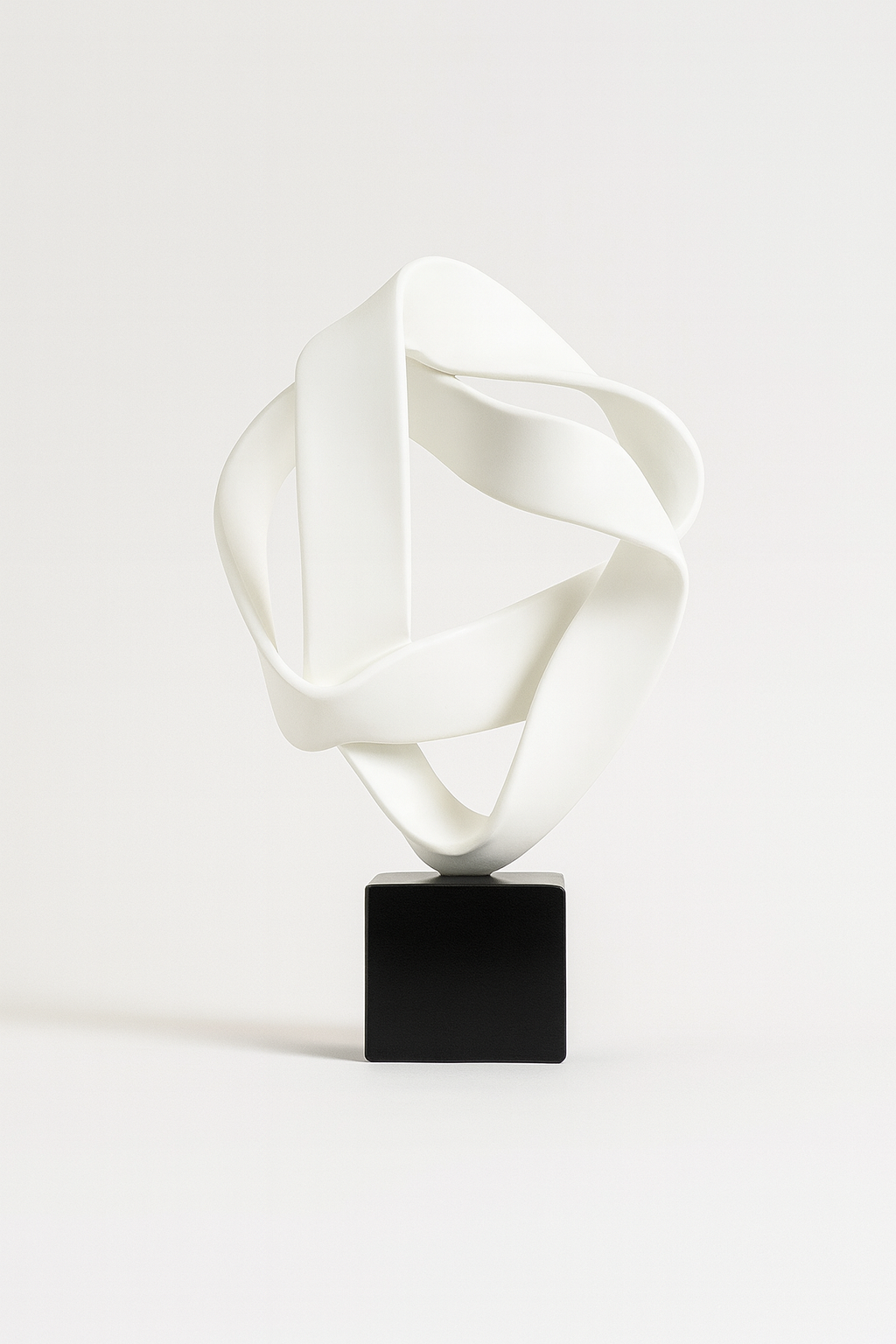 Modern White Ribbon Sculpture on Black Base – UV Homes